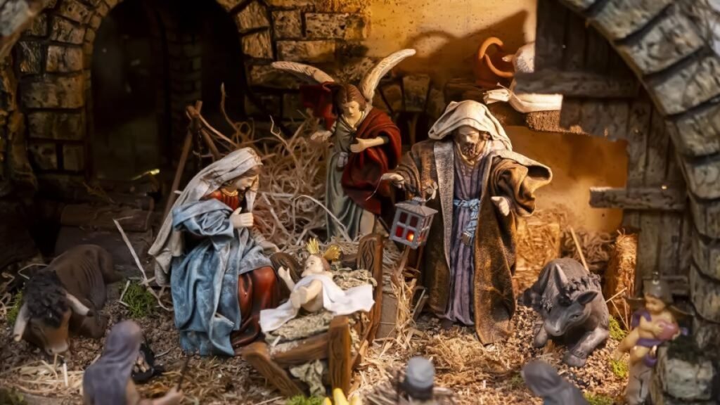 La Natività del presepe solidale di calle Santiago: la Madonna, san Giuseppe con una lanterna, un angelo, il Bambino, il bue e l’asinello.